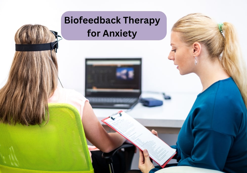 A doctor conducting biofeedback therapy of a woman for anxiety